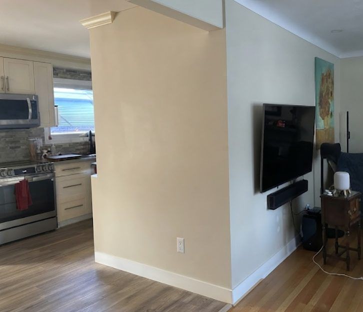 Living room wall before the slat feature wall was installed